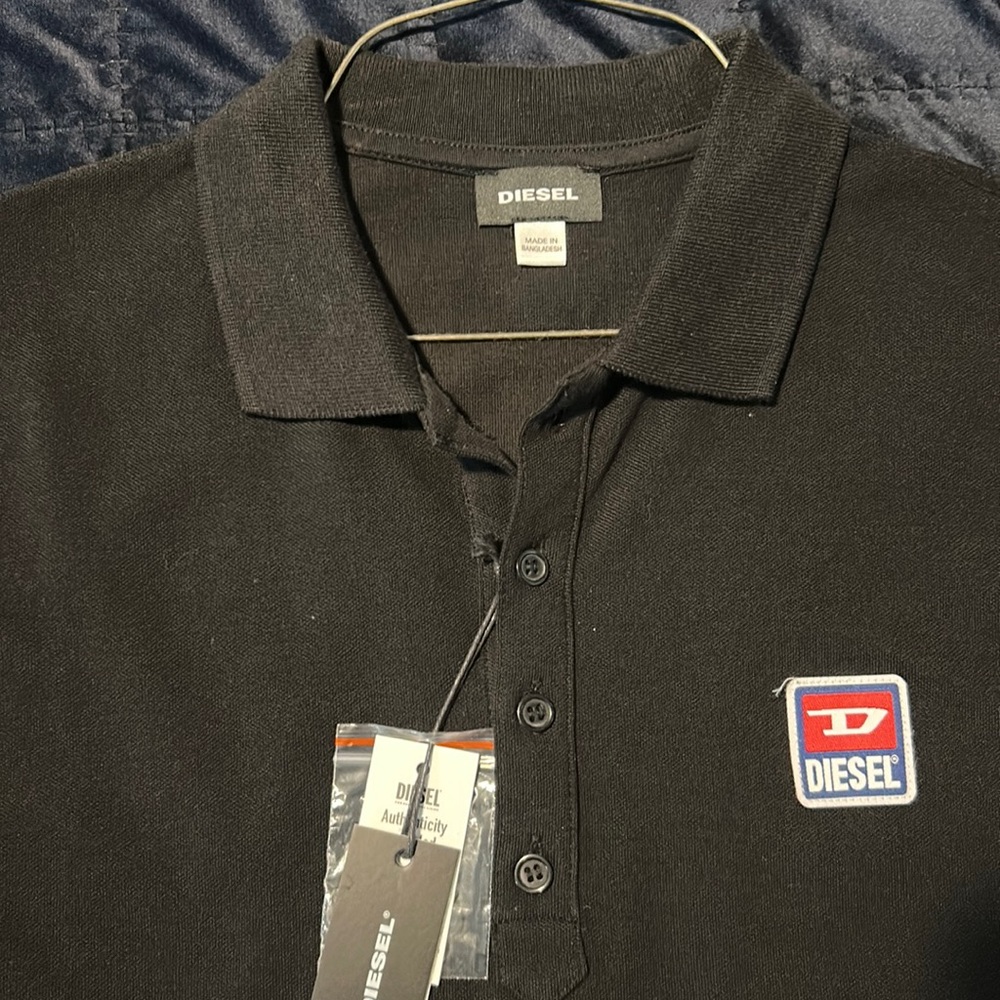 Diesel new w/ tags. Large. Just fits a little small. Black.